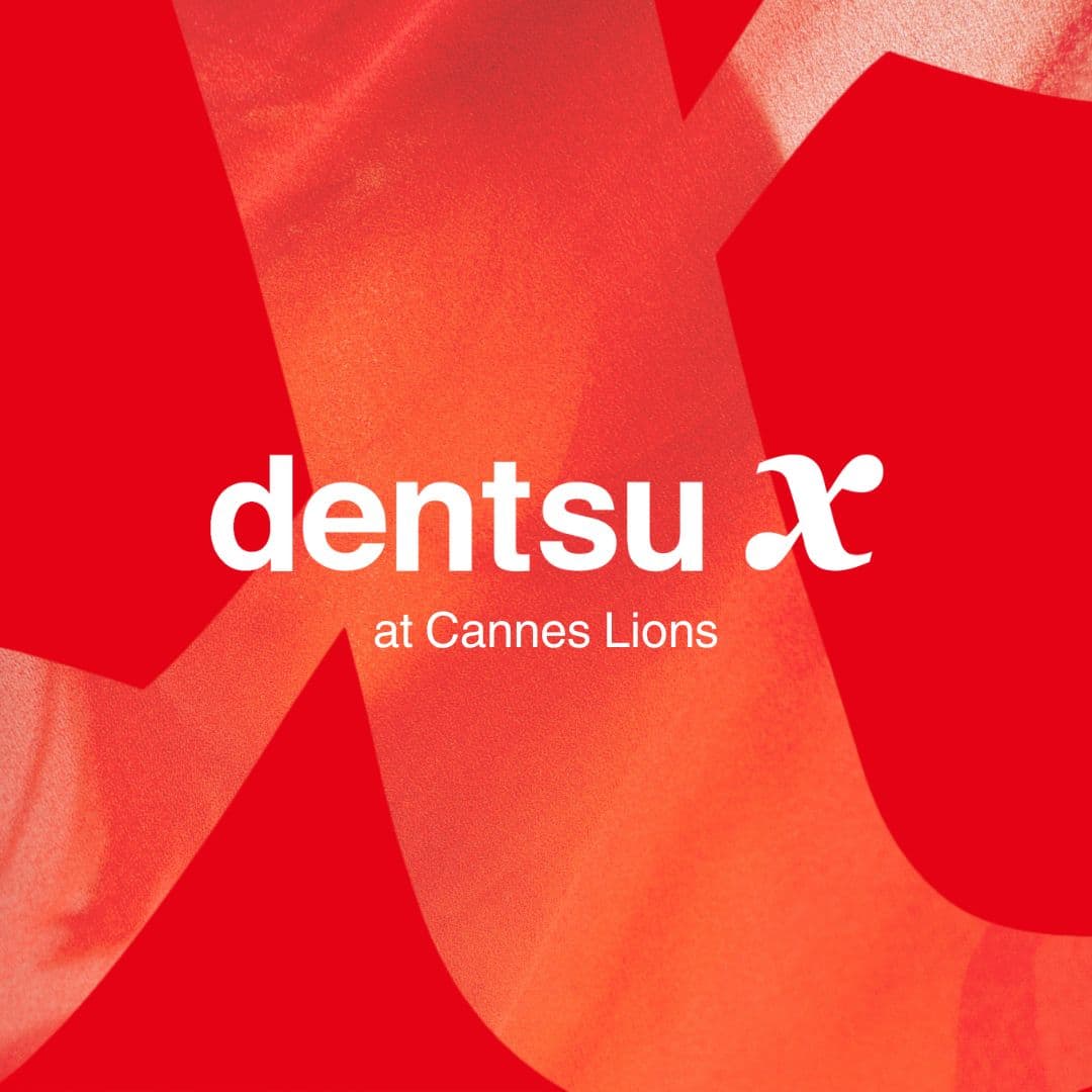 dentsu x logo at Cannes lions 2024