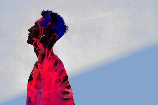 image of silhouette of man looking upwards