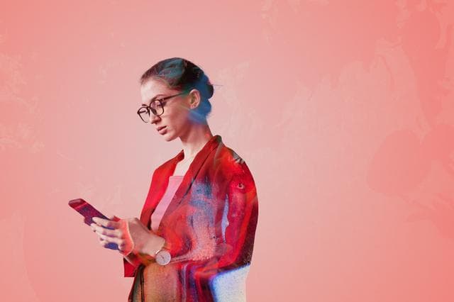 woman looking at phone