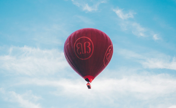 Brand name on hot air balloon- dentsu X